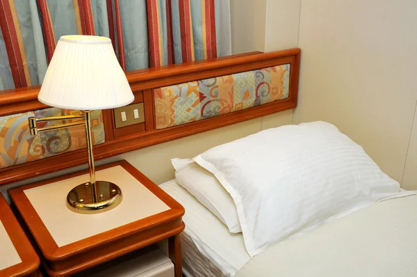 Bed in cruise ship cabin — Stock Photo, Image
