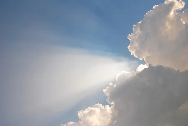 stock image Sun rays penetrating the clouds