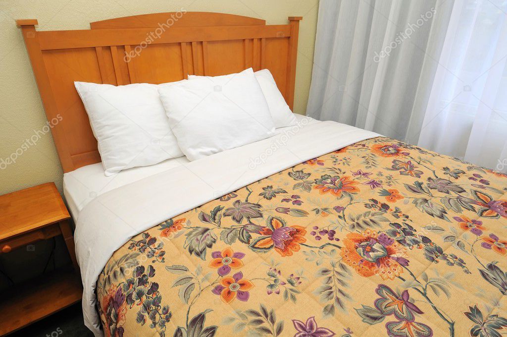 Single bed with curtains