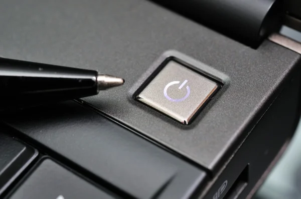 Penna och power knappen — Stockfoto