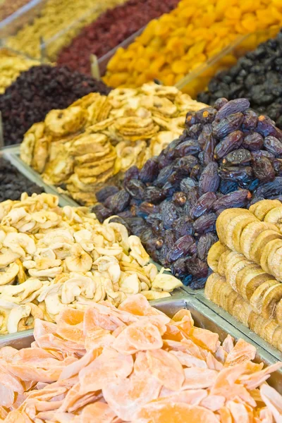 Colorful dried fruit and dates — Stock Photo, Image