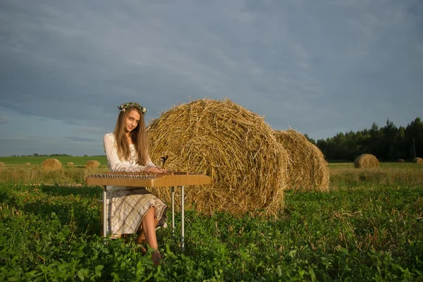 stock image Girl playing on cymbalo