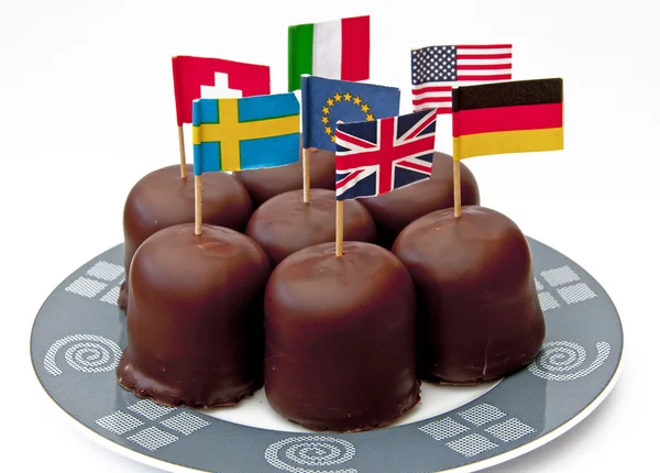 Bayrakları ile çikolata şekerleme — Stok fotoğraf