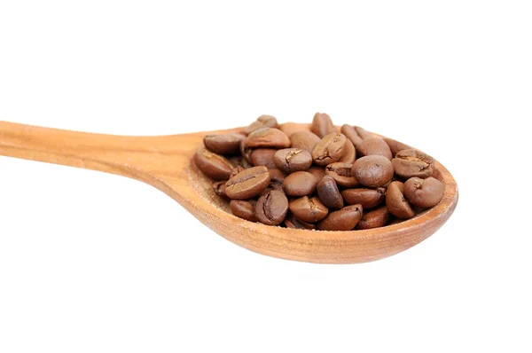 stock image Сoffee beans in wooden spoon