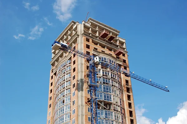 stock image Crane and highrise construction site