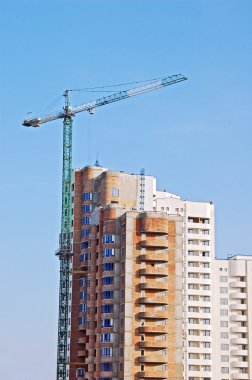 Crane and highrise construction site clipart