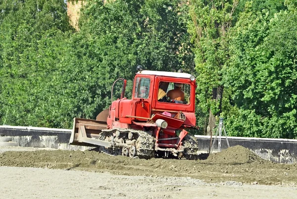 Tractor on road construction site — Stock Photo, Image