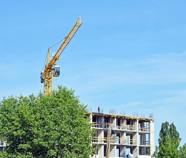 stock image Crane and highrise construction site