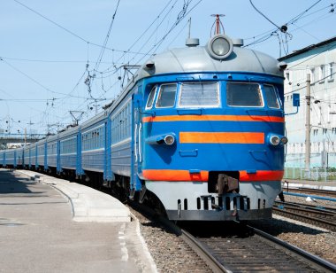 Russian electric train in expectation of passengers clipart