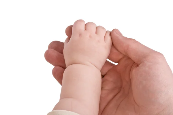 Barn och vuxen hand — Stockfoto
