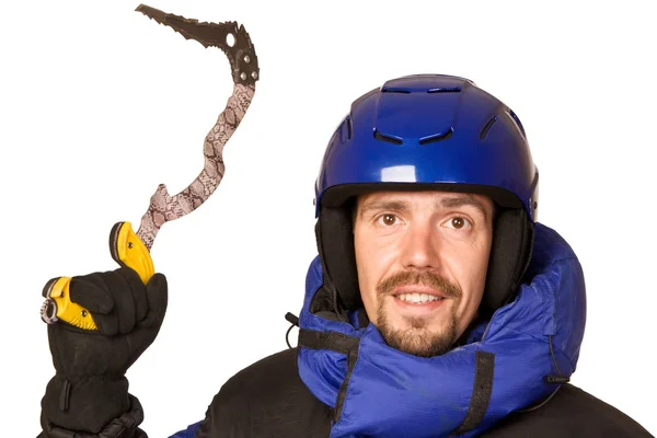 Horolezec muž s dlátem v ruce vzhůru — Stock fotografie