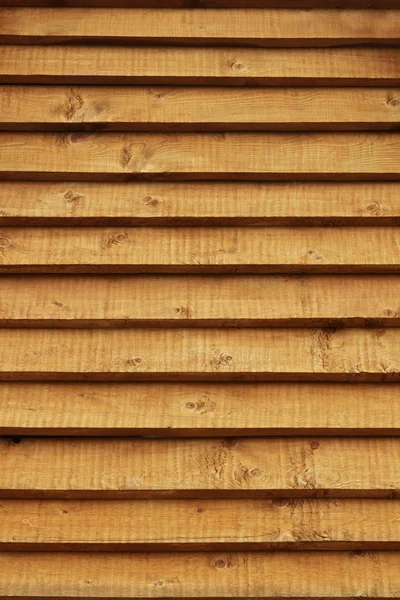 Madeira logs parede de casa rural fundo — Fotografia de Stock