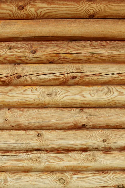 Tronchi di legno parete di sfondo casa rurale — Foto Stock