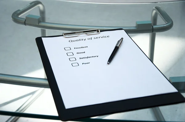 stock image Questionnaires with marks about quality of service