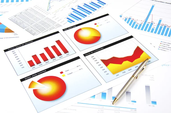 Charts and pen, success in busines — Stock Photo, Image