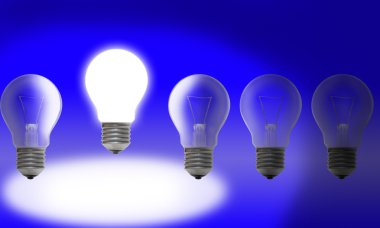 Row of light bulbs on blue background clipart