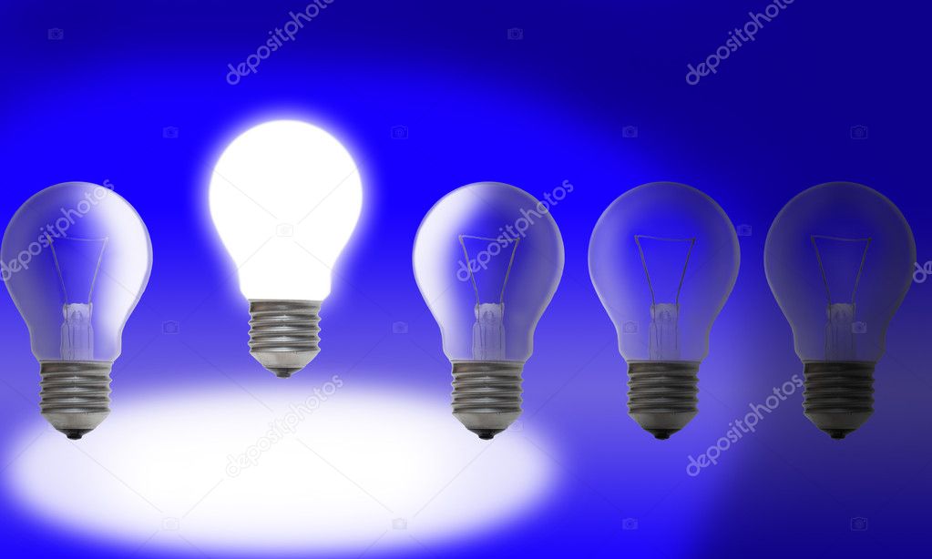 Row of light bulbs on blue background