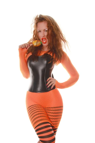 Chica joven brillante en vestido de red de pesca naranja, pantyHose rayas y corsé de PU —  Fotos de Stock