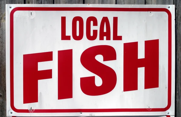 Lokala fisk tecken Stockbild