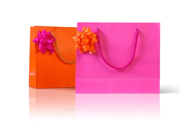 Rosa und orange Tüten — Stockfoto
