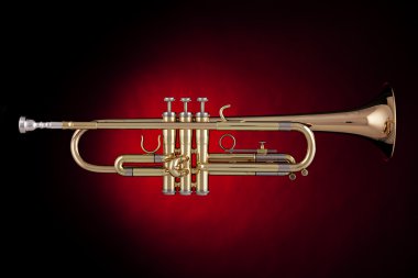 Trumpet Isolated in Red Spotlight clipart