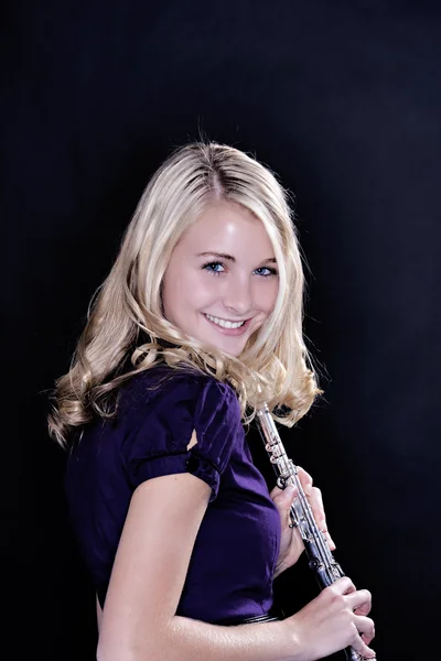Adolescente chica flauta jugador — Foto de Stock