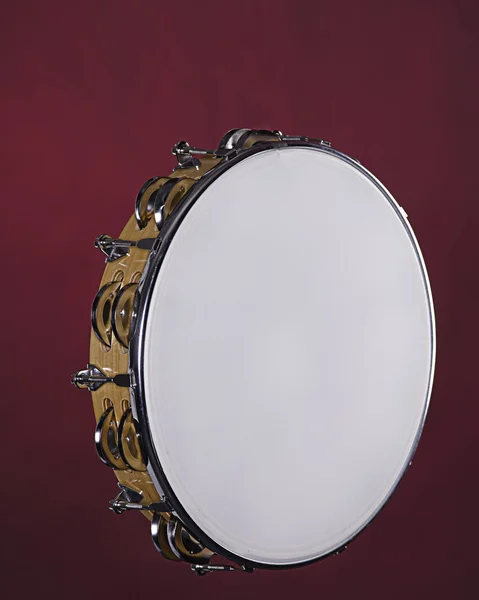 Tambourine Isolated on Red — Stock Photo, Image