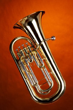 Tuba Euphonium Isolated On Gold clipart