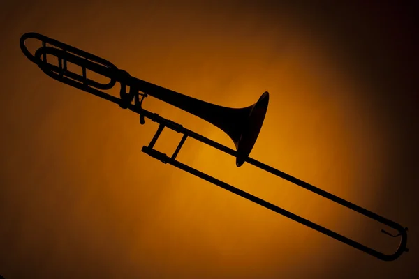 Sarı izole trombon siluet — Stok fotoğraf