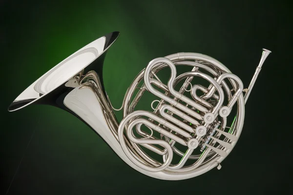 Double French Horn Isolated on Green — Stock Photo, Image