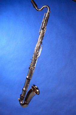 Bass Clarinet Isolated On Blue clipart