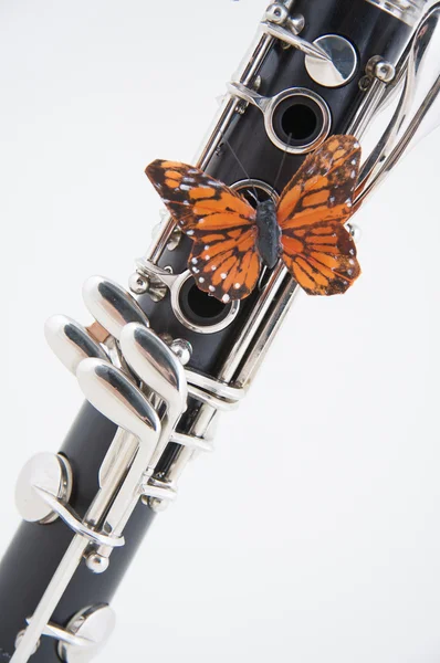 Clarinet with Butterfly on White — Stock Photo, Image