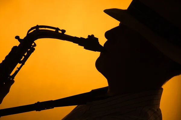 Saksofon sanatçısı siluet — Stok fotoğraf