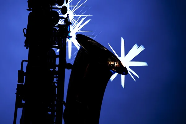 Saksafon siluet izole mavi — Stok fotoğraf