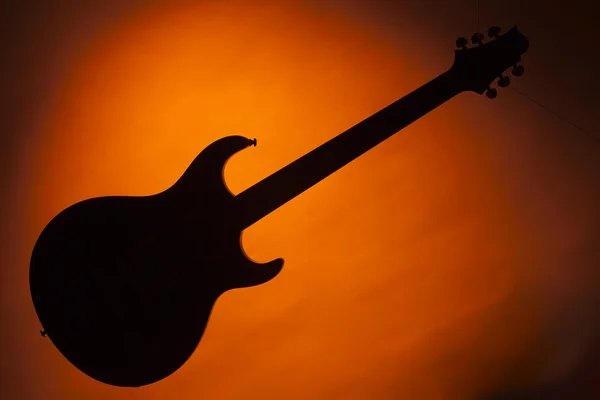 Altın izole gitar siluet — Stok fotoğraf
