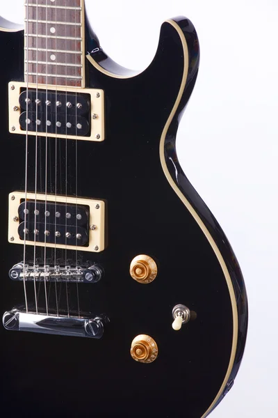 Černá elektrická kytara izolované na bílém — Stock fotografie