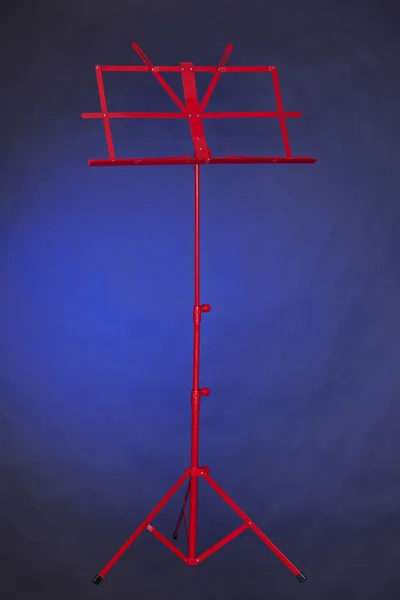 Music Stand Red Isolated on Blue — Stock Photo, Image