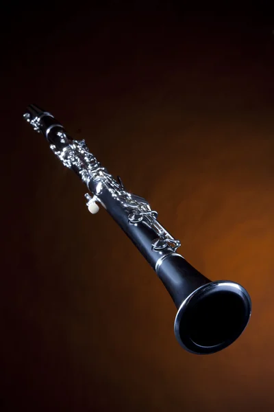 Clarinet Isolated Gold Spotlight — Stock Photo, Image