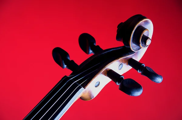 Violin Viola Scroll Isolated on Red — Stock Photo, Image