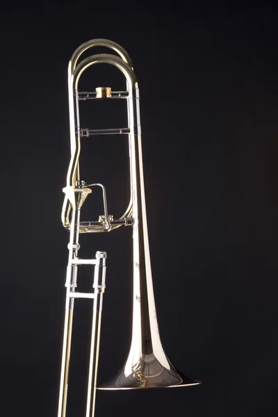 Siyah üzerine izole trombon — Stok fotoğraf