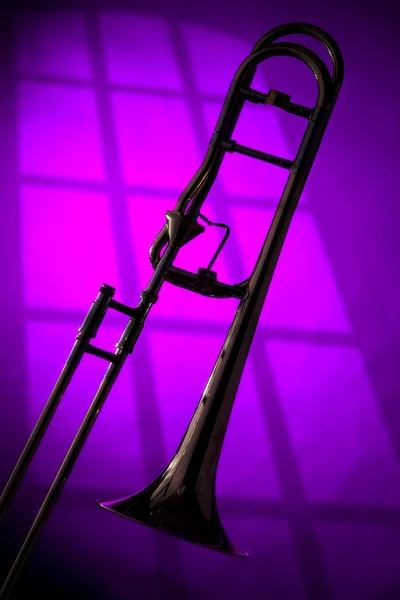 Trombone Silhouette on Purple — Stock Photo, Image