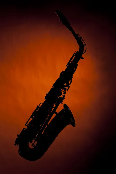 Saxofon silhuett isolerade guld — Stockfoto