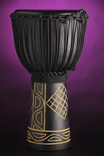 Djembe Drum Isolated on Purple Spotlight — Stock Photo, Image