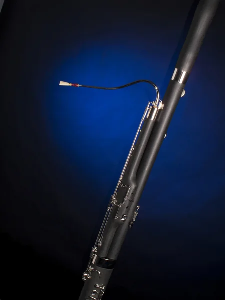Bassoon Isolated In Blue Spotlight — Stock Photo, Image