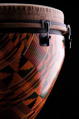 African Djembe Drum Isolated on black clipart