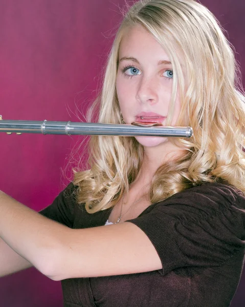 Flute Player Isolated on Pink — Stock Photo, Image