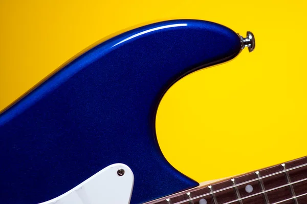 Blue Guitar Isolated On Yellow — Stock Photo, Image