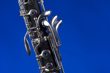 Oboe Isolated On Blue clipart