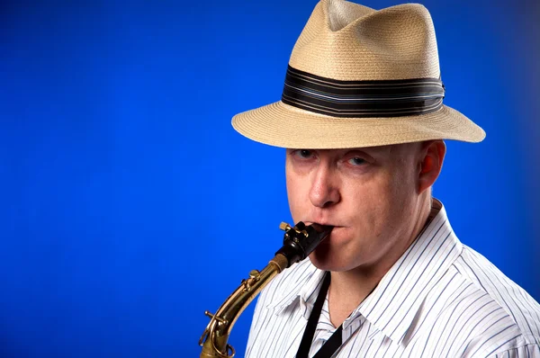 Saxophone Player on Blue — Stock Photo, Image