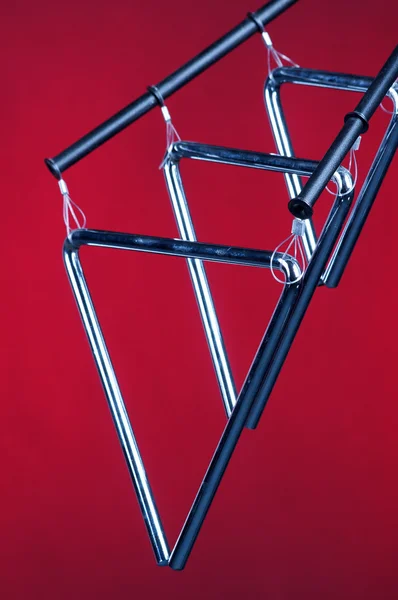 Três triângulos isolados no vermelho — Fotografia de Stock